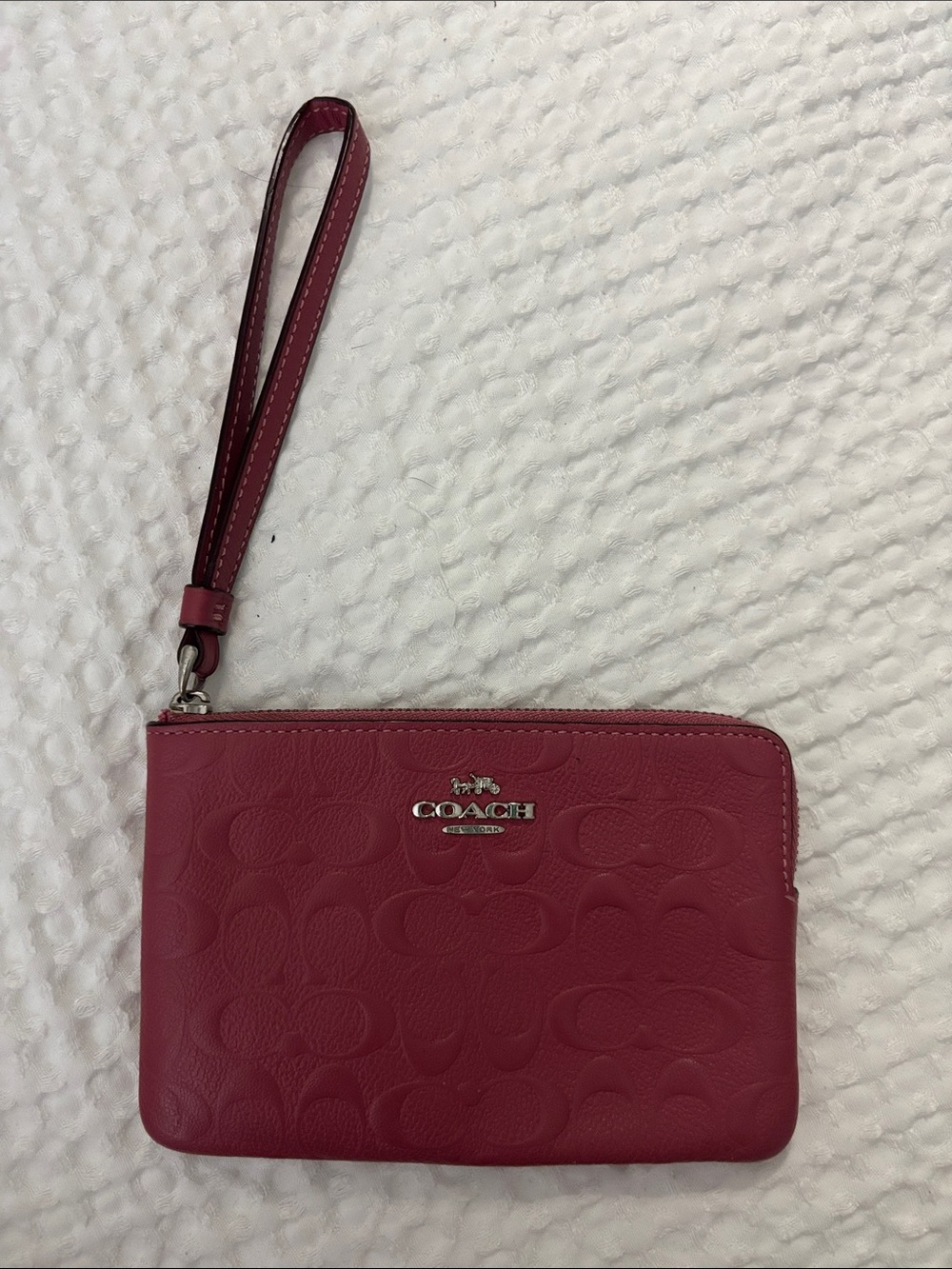 Coach Pink Signature Embossed Leather Wristlet